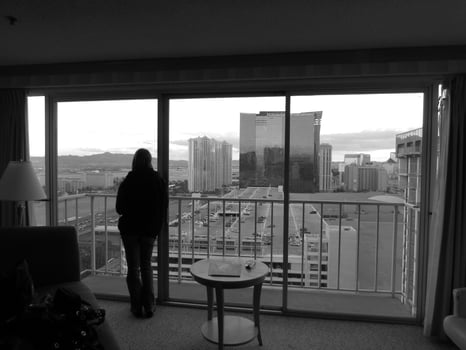 Woman Looking out Full Length Window in Las Vegas photo