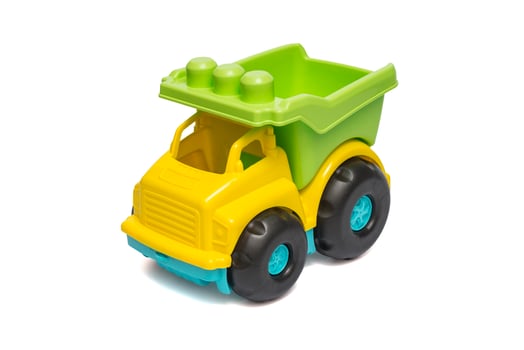 Color toy car. Colorful toy truck isolated on white background. Plastic car photo