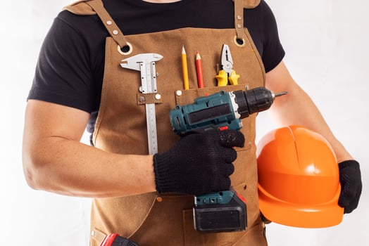 Handyman with Power Drill and Safety Gear photo