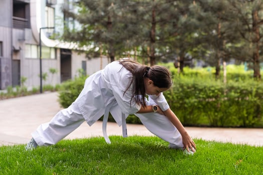 young girl in a white kimono, karate photo