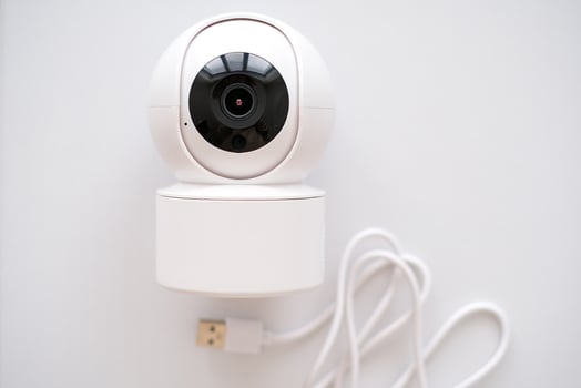 A white camera on white background photo