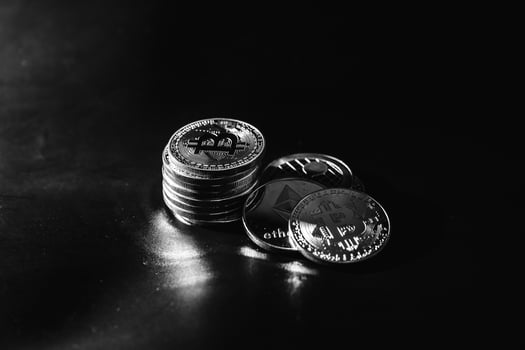 Bitcoin on a dark background. Economic crisis. photo