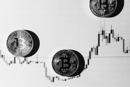 Bitcoin on a black and white background. Cryptocurrency trading. photo