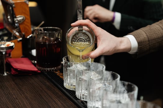 The bartender prepares cocktails for the client. photo