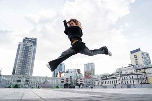 A young woman in a jump during a dance. photo