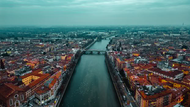City of Verona and Adige river aerial view Veneto region, Italia. Red tiled roofs. Traditional Italian architecture photo