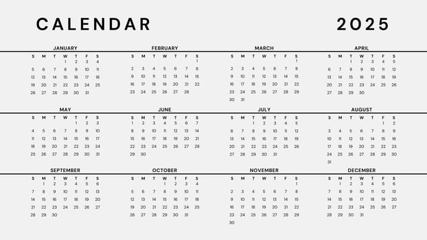 A black and white calendar with the year 2015 on it photo