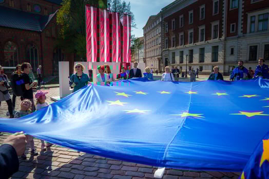 European Union celebration in Riga, Latvia vibrant scene with flags and people photo