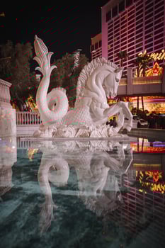 Majestic White Mythical Seahorse Sculpture, Las Vegas Night Scene photo