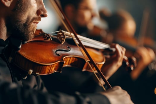 Talented musician playing violin cello in orchestra concert theatre opera musical talent skill classical music artistic performance string instrument intelligent person clear sound live photo