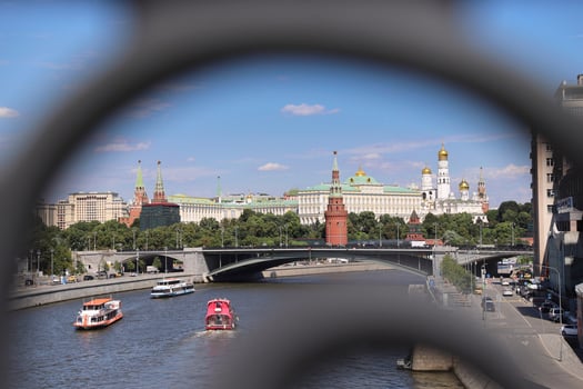 View of the Moscow Kremlin and city center through the blurred bridge , Russia. Selective focus. photo