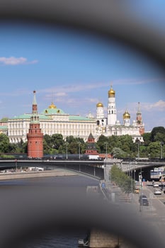 View of the Moscow Kremlin from the blurred bridge, Russia. Selective focus. photo