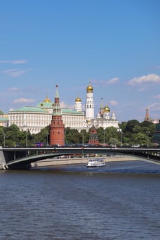 View of Kremlin, Moskva river and orthodox church with golden domes in Moscow. photo