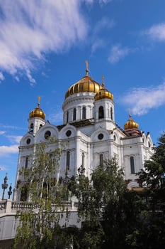 The Cathedral of Christ the Saviour is a Russian Orthodox church in Moscow.White colour with gold domes. photo