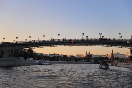 Patriarshiy pedestrian bridge with people taking pictures and selfies on it. photo