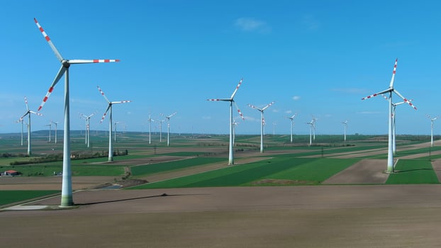 Wind turbines and agriculture fields photo