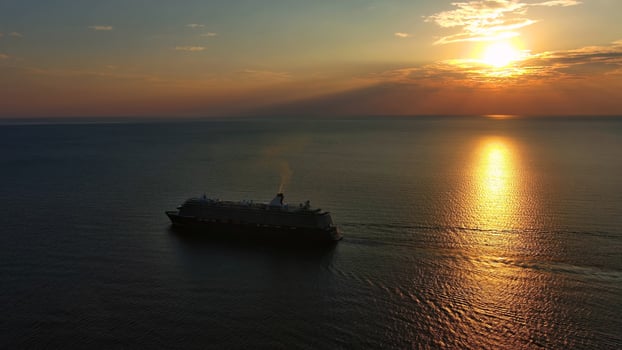 Cruise ship during sunset photo