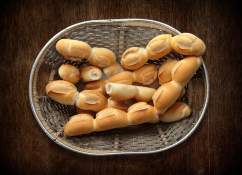 delicious French breads coming out of the oven photo