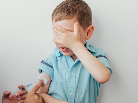 Little boy is afraid to vaccinate photo