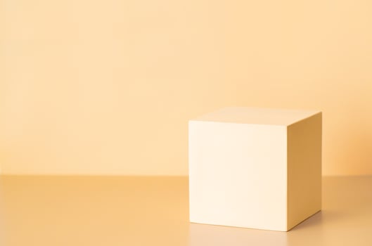 Light cub podium on yellow background photo
