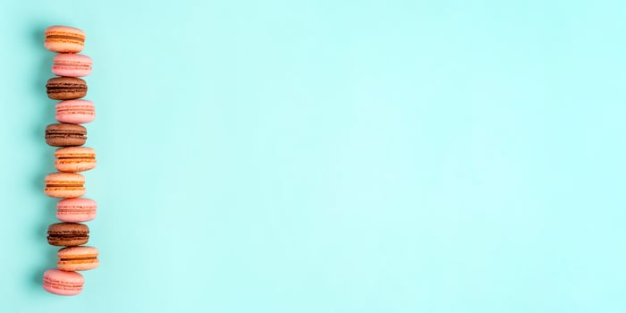 Macarons on blue, banner with copy space photo