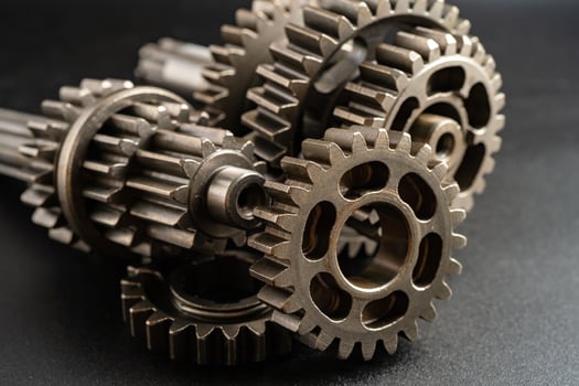 Gear and cogs wheels, clock mechanism, brass metal engine industrial. photo