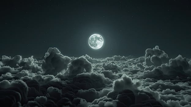 A full moon is seen over the clouds photo