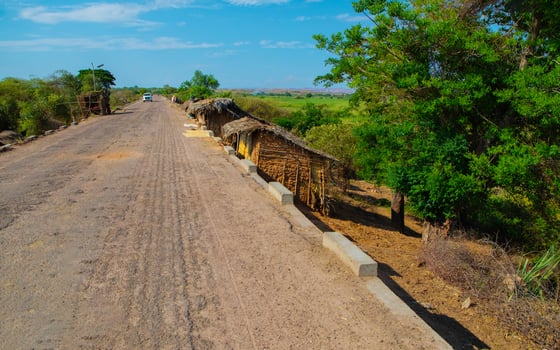 Road through village in central Madagascar photo