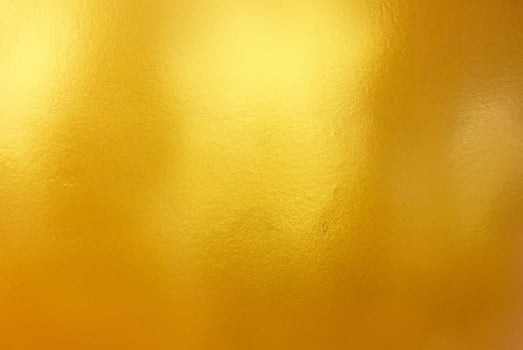 High-Quality Gold Polished Metal Steel Texture Background photo