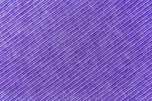 Natural purple linen texture with striped diagonal pattern as background, wallpaper photo