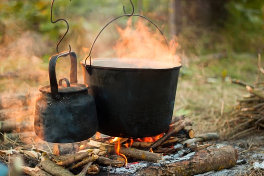 the Tourist pot over the camp fire photo
