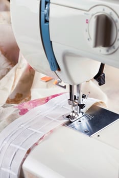 sewing machine and fabic photo