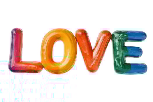 Colorful 3D LOVE word balloon design isolated on a white background, ideal for Valentines Day and romantic concepts photo