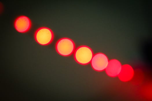 Defocused abstract background of red light in the night photo