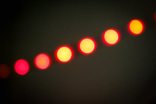 Defocused abstract background of red light in the night photo