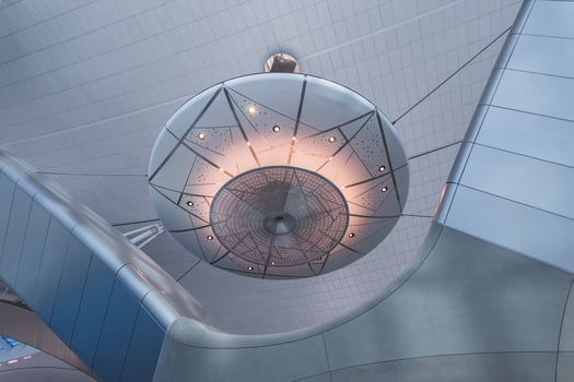 Beautiful interior with lines and lamps in a modern airport in Abu Dhabi. Travel and check in. Design and construction photo