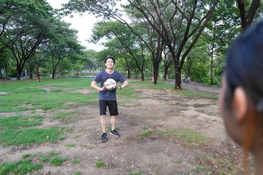 female soccer players practice using the ball in the park field diligently and happily. photo