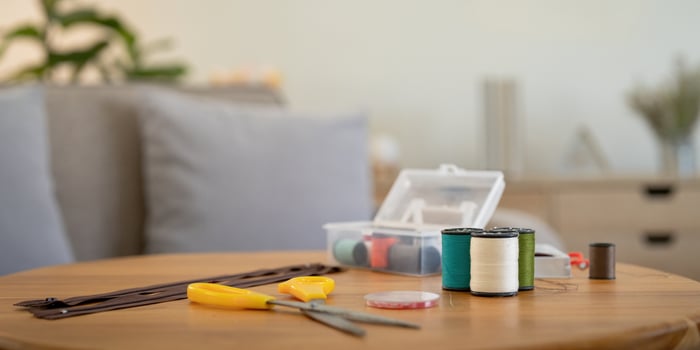 Tool to repair old clothes. Sewing and home needlework. recycling, repair concept, Sustainable, zero waste lifestyle concept photo