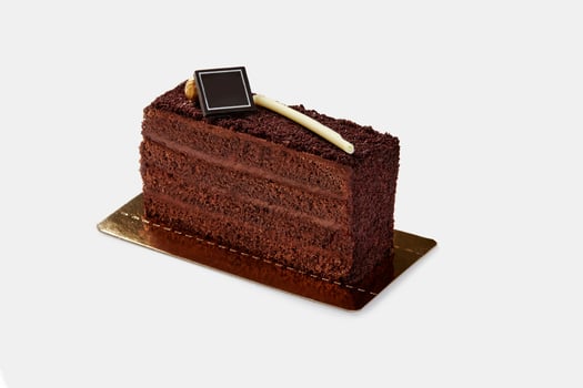 Chocolate truffle pastry with crunchy streusel and branding plaque photo
