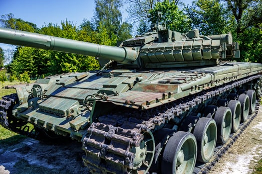 tank t80, armored vehicles with dynamic protection unit on street in green khaki color photo