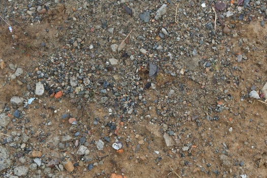 photography of rocky, sandy soil background texture photo