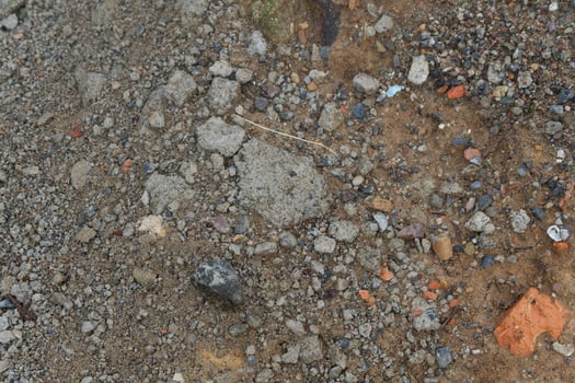 photography of rocky, sandy soil background texture photo