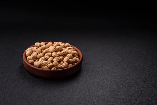 Dry soybean meat pellets, diet food for vegan and vegetarian cuisine photo