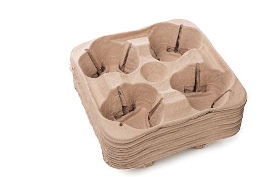A set of craft holders for 4 glasses. Cardboard coasters for drinks photo