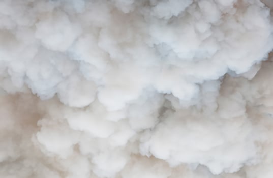 Dynamic Contrast, Close-Up of Swirling White and Billowing Black Smoke photo