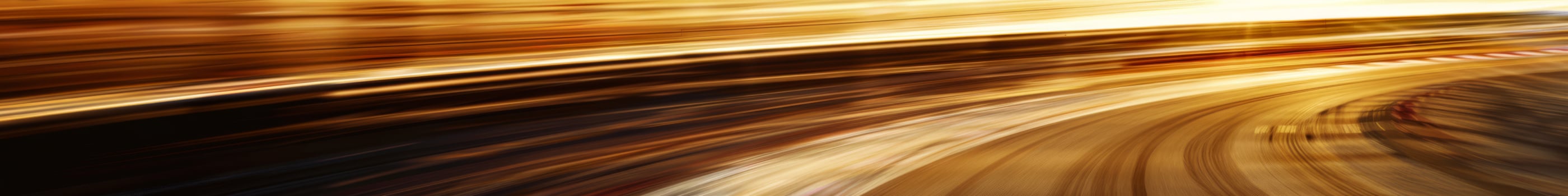 High Speed Motion Blur at a Racetrack Turn photo