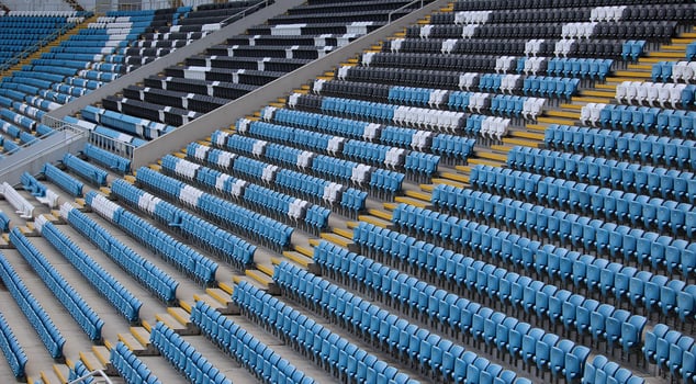 Lines Of Empty Plastic Spectators Chairs In A Grandstands photo