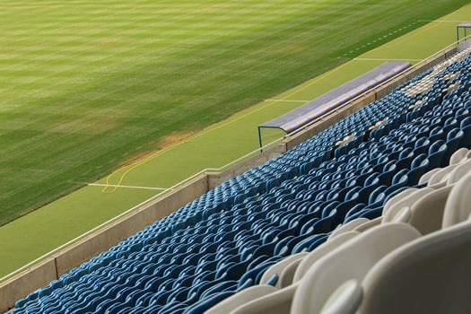 Closed Sport Stadium With Empty Grandstands photo