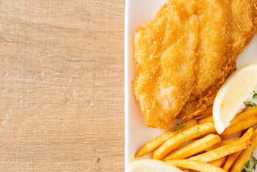 fish and chips - fried fish fillet with potatoes chips photo