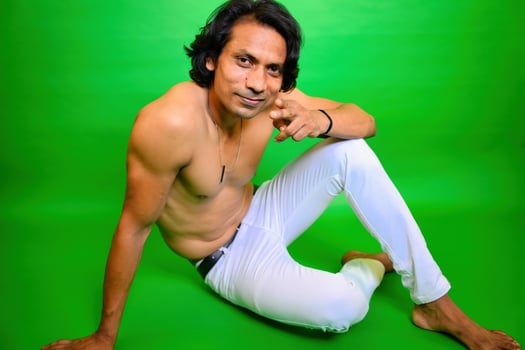 Happy young men sitting pose photo